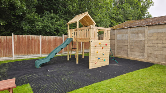 Eastnor Play Tower with ladder, climbing wall, net, and slide