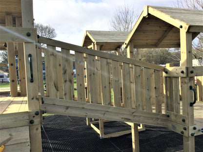 Ludlow Commercial Climbing frame with towers, slides, climbing wall, climber, fireman’s pole and bridges